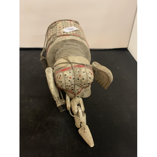 131 - A WOODEN CARVED ELEPHANT PUPPET