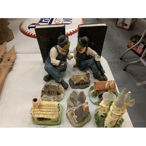 134 - AN ASSORTMENT OF POTTERY ITEMS TO INCLUDE A PAIR OF LAUREL AND HARDY BOOKENDS A/F