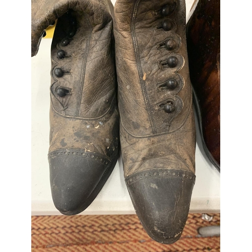 149 - A PAIR OF VICTORIAN BUTTON FASTENING LEATHER BOOTS