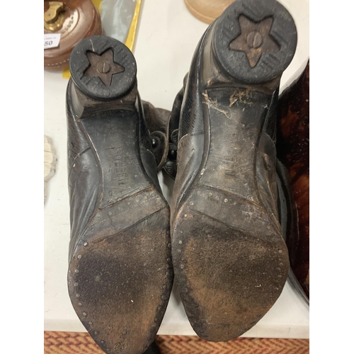 149 - A PAIR OF VICTORIAN BUTTON FASTENING LEATHER BOOTS