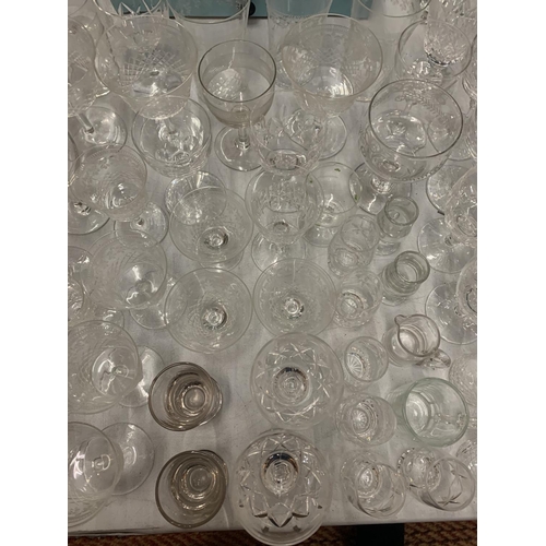 158 - A LARGE QUANTITY OF GLASS WARE TO INCLUDE TUMBLERS, WINE AND SHERRY GLASSES ETC