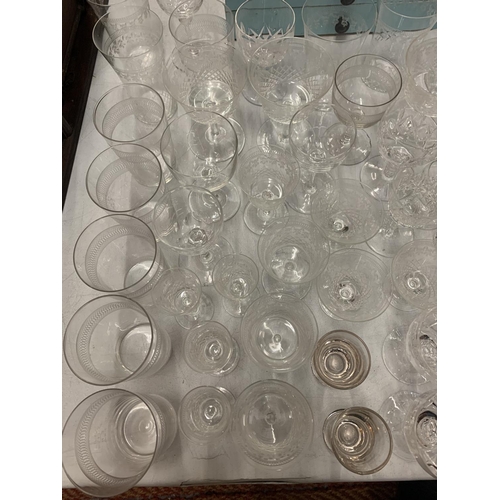 158 - A LARGE QUANTITY OF GLASS WARE TO INCLUDE TUMBLERS, WINE AND SHERRY GLASSES ETC