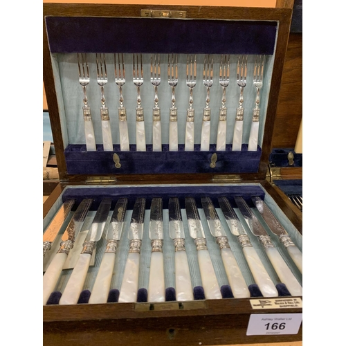 166 - TWO WOODEN BOXES OF SILVER PLATE FLATWARE TO INCLUDE A SET WITH PEARLESCENT HANDLES