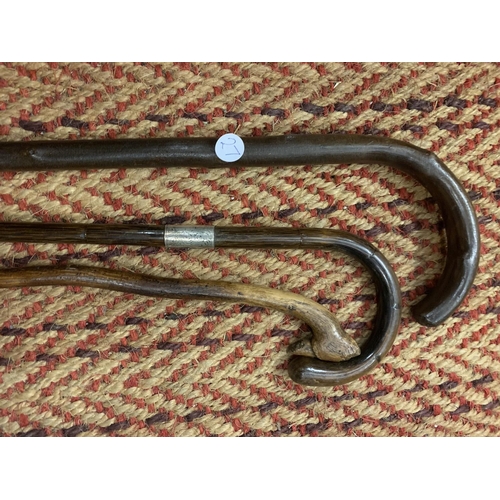 190 - A 1925 SILVER MOUNTED PARTRIDGE WOOD WALKING STICK AND TWO FURTHER EXAMPLES