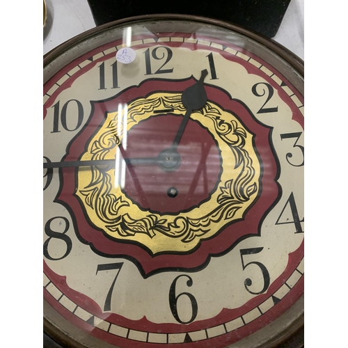 209 - A LARGE VINTAGE CIRCULAR WALL CLOCK WITH DECORATIVE FACE