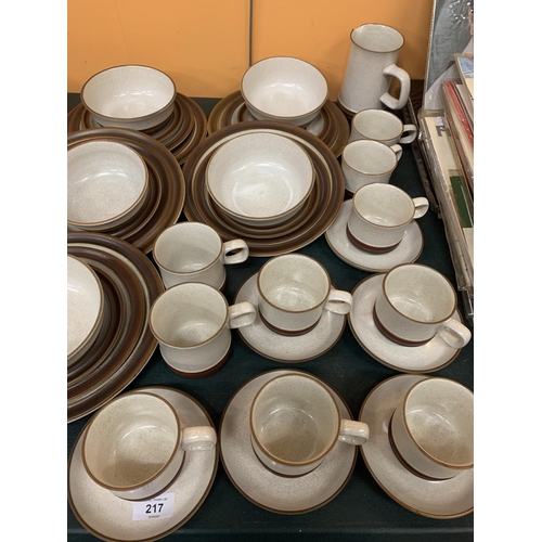 217 - A LARGE QUANTITY OF DENBY STUDIO DINNER WARE