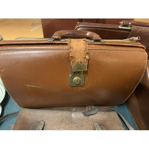 220 - AN ASSORTMENT OF VINTAGE AND LEATHER EFFECT BRIEFCASES