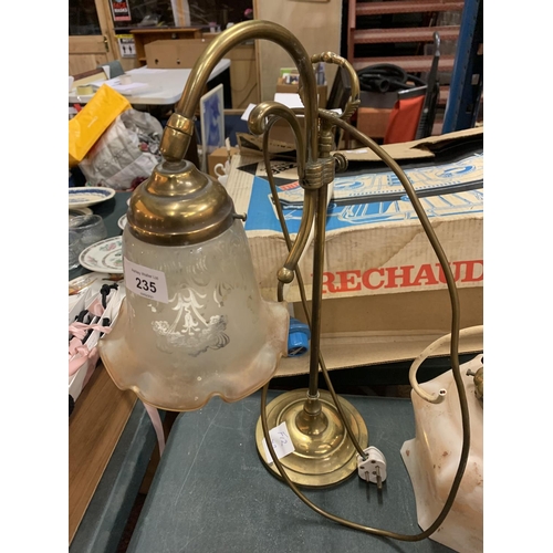 235 - AN ORNATE BRASS TABLE LAMP AND A FURTHER ORNATE LIGHT FITTING