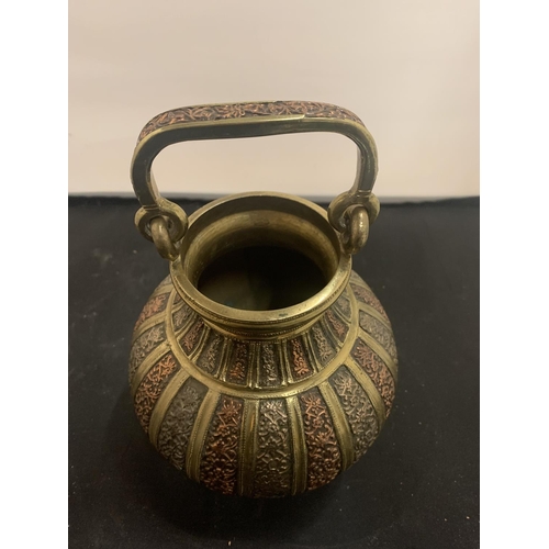 61 - A BRASS AND COPPER TWIN HANDLED POT H:16CM