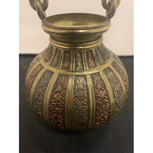 61 - A BRASS AND COPPER TWIN HANDLED POT H:16CM