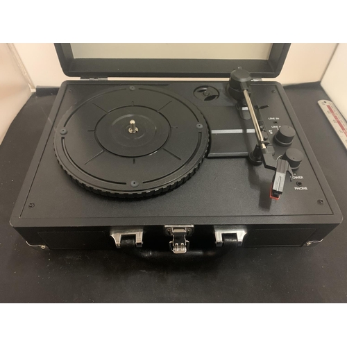 64 - AN AKAI PORTABLE TURNTABLE