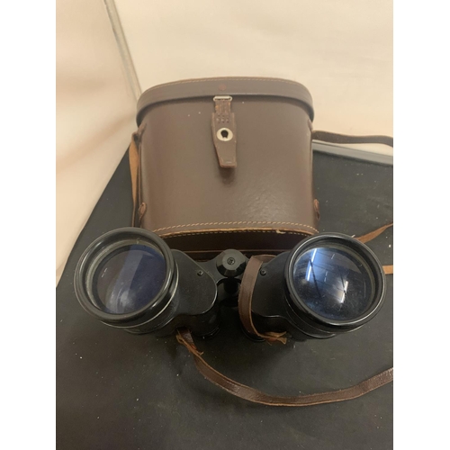 68 - A PAIR OF LEATHER CASED 10X50 FIELD BINOCULARS