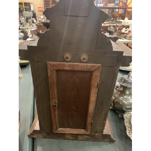 84 - A LARGE WOODEN MANTEL CLOCK (FINIALS A/F) APPROXIMATE HEIGHT 60CM