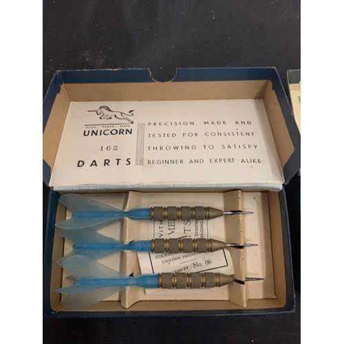 89 - TWO BOXES OF VINTAGE UNICORN DARTS TO ALSO INCLUDE A PAIR OF GONG STICKS