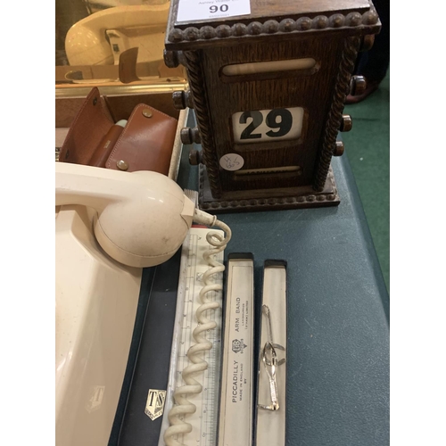 90 - A SELECTION OF INTERESTING ITEMS TO INCLUDE A RETRO WALL TELEPHONE, A 1920s WOODEN DESK CALENDAR ETC