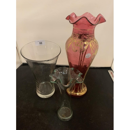 99 - A CRANBERRY GLASS VASE WITH GOLD DETAIL (H: 34CM) AND A FURTHER TWO CLEAR GLASS VASES, ONE WITH FLUT... 