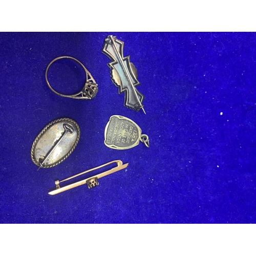 567 - THREE BROOCHES TWO MARKED SILVER, A SILVER RING AND A ST CHRISTOPHER PENDANT