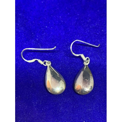 571 - TWO PAIRS OF SILVER EARRINGS ONE TEARDROP STYLE AND ONE NAVAJO DESIGN