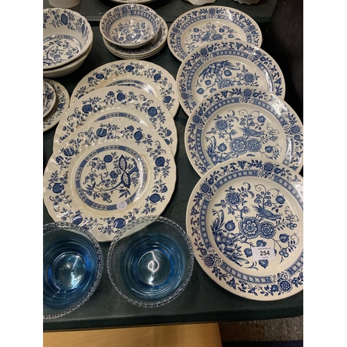 254 - A COLLECTION OF VARIOUS CERAMICS TO INCLUDE PLATES, CUPS, SAUCER, BOWLS AND GLASSES