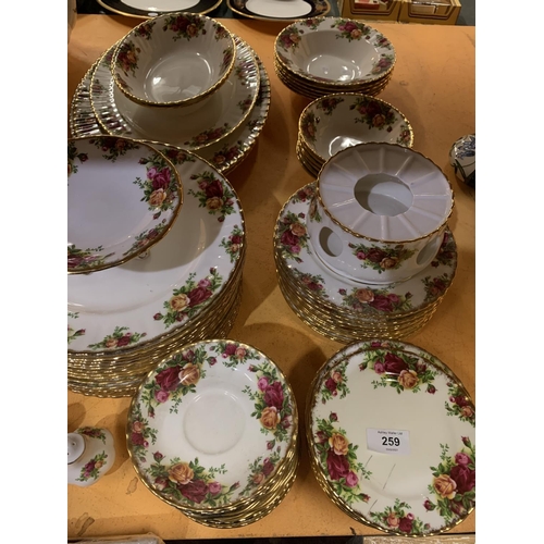 259 - A LARGE COLLECTION OF ROYAL ALBERT OLD COUNTRY ROSES DINNER WARE TO INCLUDE PLATES, SIDE PLATES, DES... 