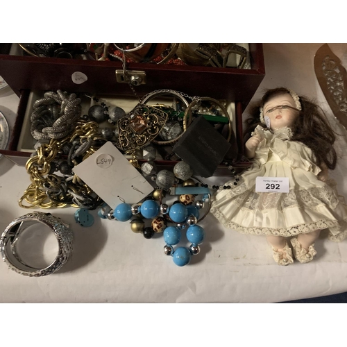 292 - A JEWELLERY BOX WITH COSTUME JEWELLERY AND A PORCELAIN DOLL