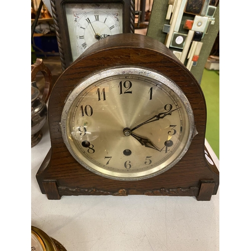 828 - A WOODEN NAPOLEONS HAT STYLE MANTLE CLOCK, BRASS BAROMETER AND A MODEL CAR