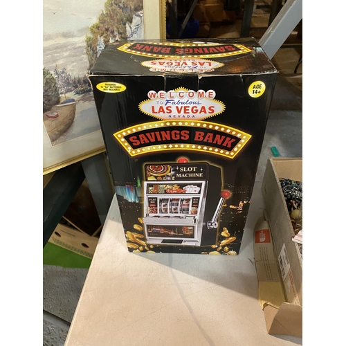 839 - A BOXED LAS VEGAS SLOT MACHINE MONEY BOX