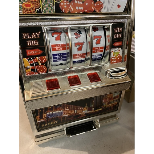 839 - A BOXED LAS VEGAS SLOT MACHINE MONEY BOX