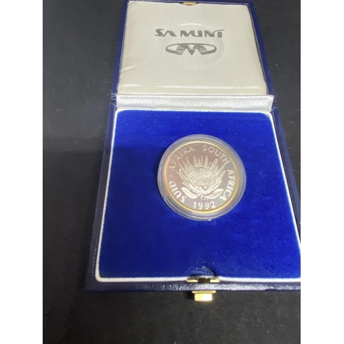 305 - A SOUTH AFRICA 1992 , 1 RAND SILVER COIN . THE ITEM IS ENCAPSULATED AND CASED . PRISTINE CONDITION.