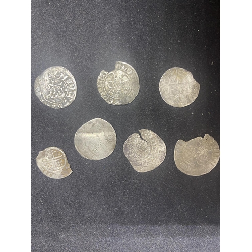 329 - SEVEN HAMMERED COINS