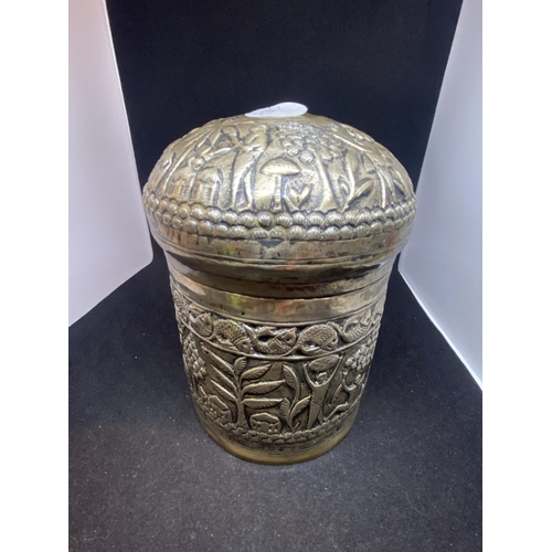 586 - A CONTINENTAL BELIEVED SILVER TEA CADDY WITH AN ORNATE DESIGN