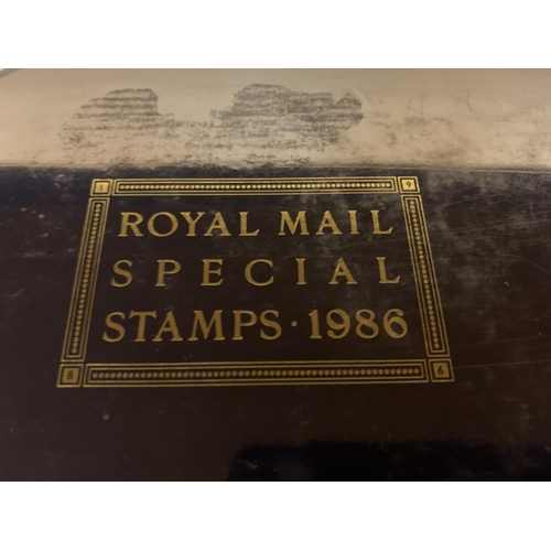 345 - TWO HARD BACK ALBUMS CONTAINING STAMPS FROM 1985 AND 1986