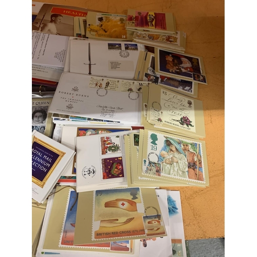 349 - A LARGE QUANTITY OF FIRST DAY STAMPS AND POSTCARDS FEATURING 'THE MILLENNIUM COLLECTION' AND 'HER MA... 