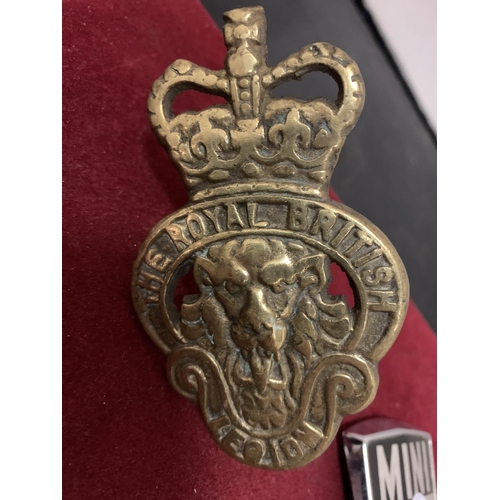 651 - A ROYAL BRITISH LEGION BRASS GRILLE BADGE AND TWO MINI BADGES