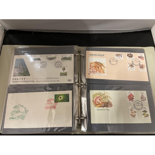 373 - FIRST DAY COVER ALBUM CONTAINING A QUANTITY OF AUSTRALIAN COVERS + FIJI & AAT