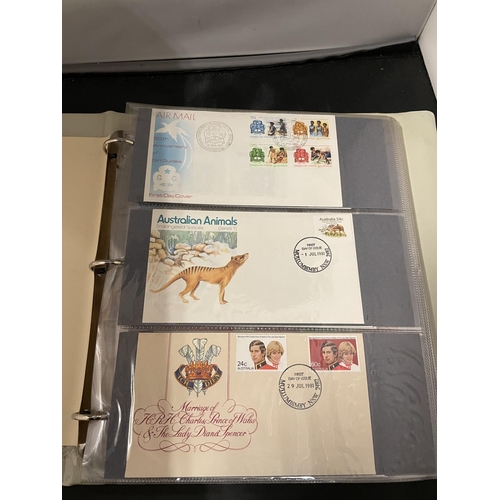 373 - FIRST DAY COVER ALBUM CONTAINING A QUANTITY OF AUSTRALIAN COVERS + FIJI & AAT