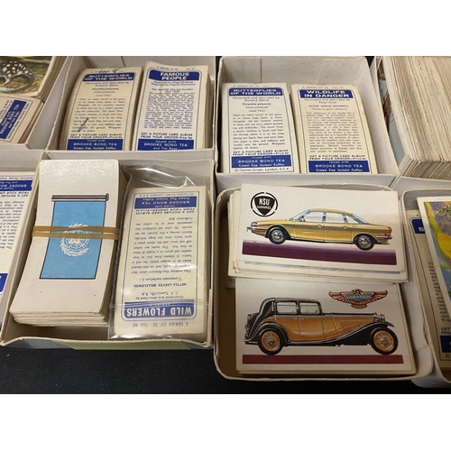 897 - EIGHT BOXES OF TEA CARDS TO INCLUDE MOTOR CARS AND WILD BIRDS