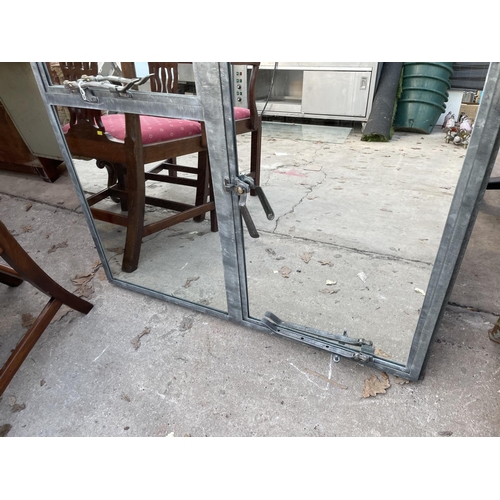 2389A - A VINTAGE STYLE GALVANISED WINDOW FRAME WITH THREE MIRRORED PANELS