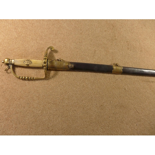 329A - A NAVAL SWORD OF UNKNOWN AGE, THE GRIP DECORATED WITH AN ANCHOR, COMPLETE WITH SCABBARD