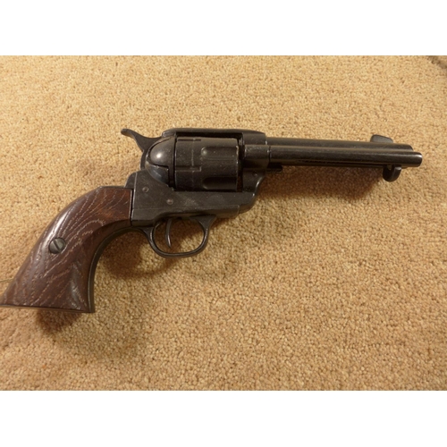 336A - A COWBOY GUN RIG, COMPRISING A REPLICA NON FIRING COLT REVOLVER AND A BLACK LEATHER HOLSTER