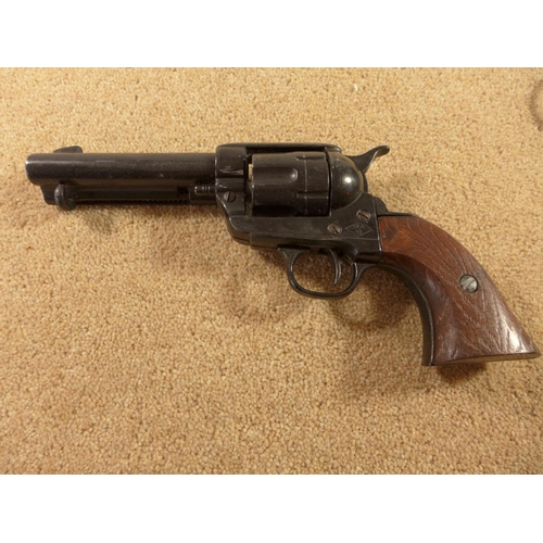 336A - A COWBOY GUN RIG, COMPRISING A REPLICA NON FIRING COLT REVOLVER AND A BLACK LEATHER HOLSTER