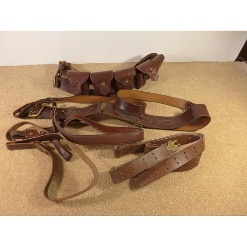 353 - A BROWN LEATHER CARTRIDGE BELT, SAM BROWNE BELT ETC