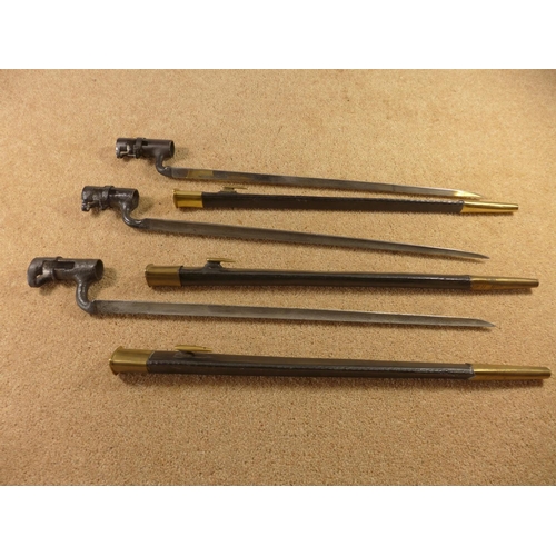 369 - A MARTINI HENRY TYPE BAYONET AND TWO SIMILAR BAYONETS (3)