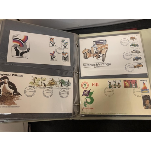 611 - FIRST DAY COVER ALBUM CONTAINING A QUANTITY OF AUSTRALIAN COVERS + FIJI & AAT