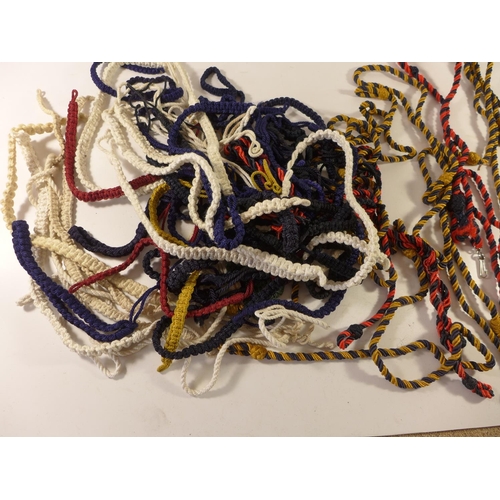 442 - A COLLECTION OF MILITARY LANYARDS, VARIOUS REGIMENTS AND COLOURS