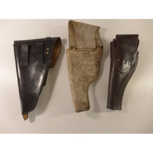 451 - THREE LEATHER HOLSTERS