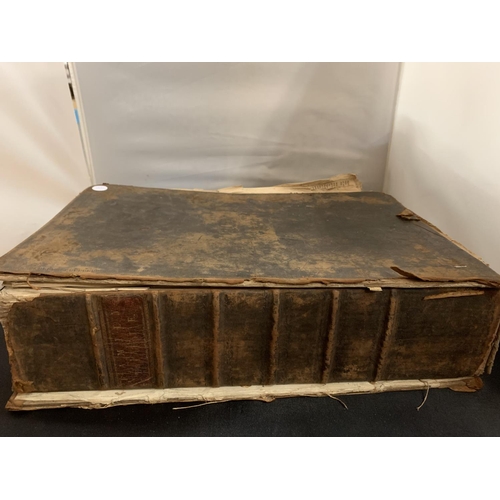 61 - A LARGE HEAVY VINTAGE FAMILY BIBLE (42X30X10CM) - SPINE REQUIRES REPAIR