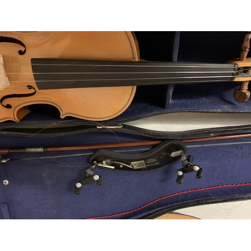 259 - A HALF CASE VIOLIN TO INCLUDE CHIN REST AND BOW