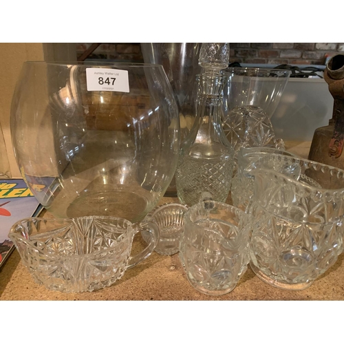 807 - AN ASSORTMENT OF GLASS WARE TO INCLUDE CUT GLASS AND THREE MODERN VASES