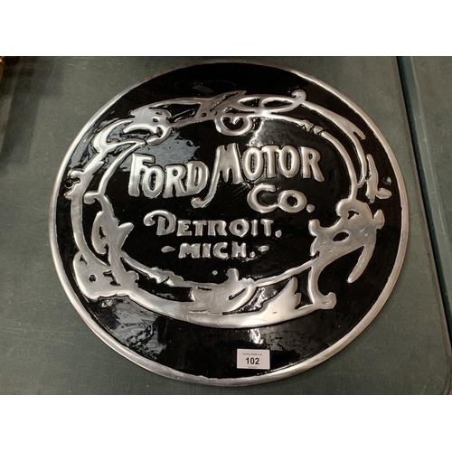 102 - A 'FORD MOTOR COMPANY' BLACK AND SILVER METAL SIGN (D: 49.5CM)